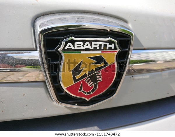 Berlin, Germany - July 9, 2018: Abarth 595 car logo.\
Abarth SpA is a racing car and road car maker founded by\
Italo-Austrian Abarth in 1949. Its logo is a shield with a scorpion\
on red and yellow back