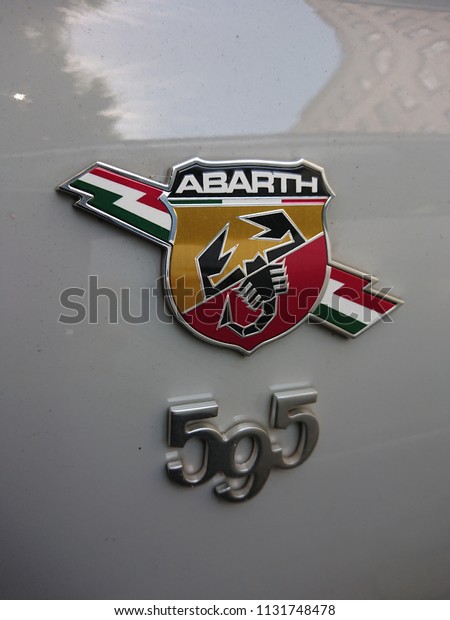 Berlin, Germany - July 9, 2018: Abarth 595 car logo.\
Abarth SpA is a racing car and road car maker founded by\
Italo-Austrian Abarth in 1949. Its logo is a shield with a scorpion\
on red and yellow back