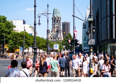 Berlin, Germany - June 09, 2018: People Crossing Street At Berlin`s Most Famous Shopping Avenue, The  Kurfuerstendamm A.k.a. Kudamm On A Summer Day