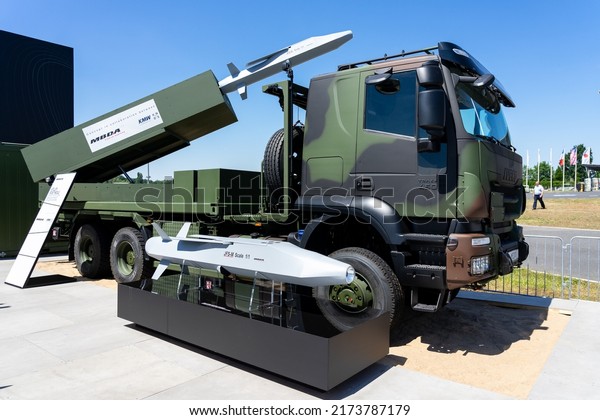 BERLIN, GERMANY - JUNE 23, 2022:\
Artillery Rocket Module - concept for a future missile and rocket\
artillery platform by MBDA. Exhibition ILA Berlin Air Show\
2022