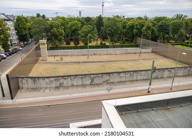 Berlin, Germany - June 29, 2022: The Berlin Wall Memorial in the Bernauer Strasse. The memorial includes a 60 meter original border. View of the former death strip from the vantage point 