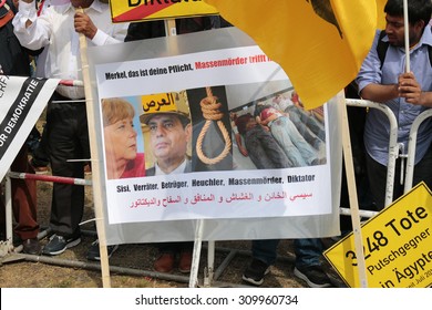 BERLIN, GERMANY - JUNE 3, 2015: People Attend The Demonstration Against The Visit Of Egyptian President Abdel Fattah El-Sisi In Berlin, Germany.