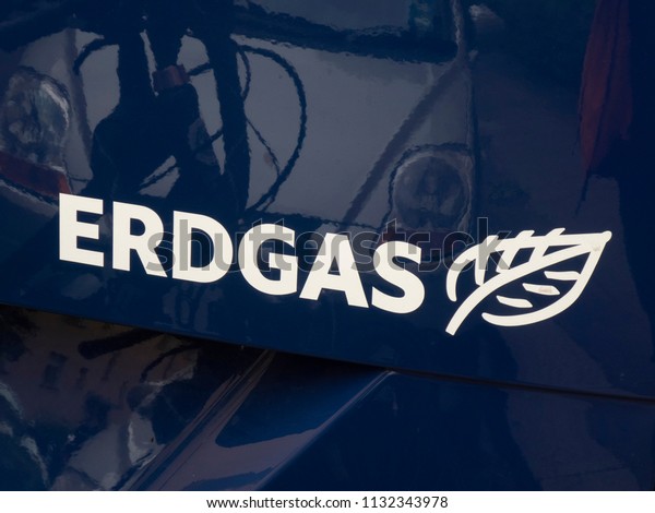 Berlin, Germany - June 3, 2018: Erdgas logo on car. A\
natural gas vehicle (NGV) is an alternative fuel vehicle for\
autonomous mobility that uses compressed natural gas (CNG) or\
liquefied natural gas