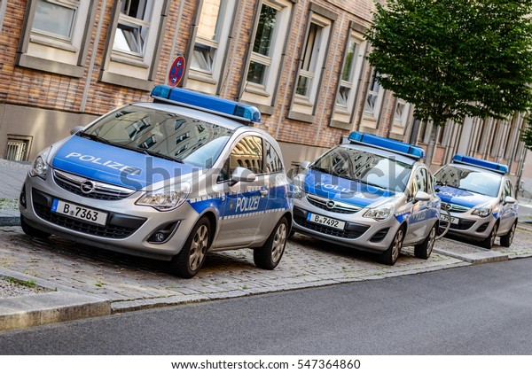 BERLIN, GERMANY - JUNE 30: german\
police cars in a row on jun 30 2016 in Berlin, Germany,\
Europe