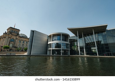 Berlin, Germany - June 4, 2019: Tourist Sightseeing Tour On River Spree At German Reichtag Building And Paul Löbe Haus In Berlin