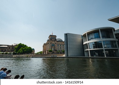 Berlin, Germany - June 4, 2019: Tourist Sightseeing Tour On River Spree At German Reichtag Building And Paul Löbe Haus In Berlin