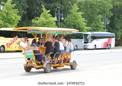 BERLIN GERMANY - JUNE 8, 2019: Unidentified People Take Cycling Beer Bike Tour Berlin Germany