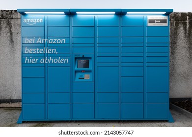 Berlin, Germany - March 13.2022: Amazon Hub-Locker in cyan where customers can pick up their order themselves