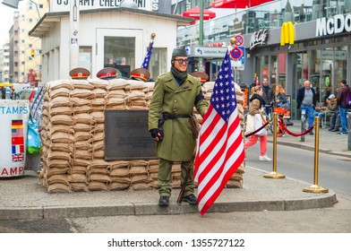 BERLIN, GERMANY - MARCH 19, 2019: American Soldier At Checkpoint Charlie