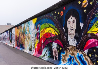 BERLIN, GERMANY - MARCH 20: Berlin Wall graffiti seen on March 22, 2015, Berlin, East Side Gallery. It's a 1.3 km long part of original Berlin Wall which collapsed in 1989.
