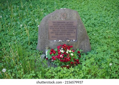 Berlin, Germany - May 15, 2022: Jewish Cemetery Weissensee in Berlin, small memorial stone to the men and women who actively fought for the liberation from National Socialism