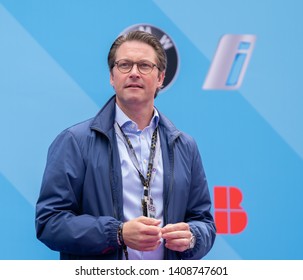 Berlin, Germany - May 25, 2019: Federal Minister of Transport and Digital Infrastructure Andreas Scheuer on the podium at the E-Prix ABB FIA Formula E race car Championship Award Ceremony