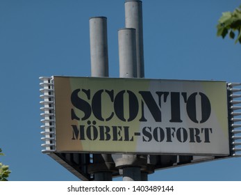 Berlin, Germany - May 29, 2018: Sconto Moebel store signage. Subsidiary of Mobel Walther AG, which today belongs to the Hoeffner Group, Sconto SB s a German retail company in the furniture industry