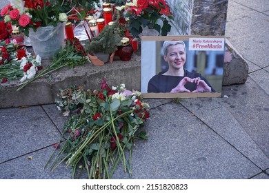 Berlin, Germany - November 29, 2020: Portrait Photo Of Maria Kalesnikava (Kalesnikova) At A Part Of Berlin Wall, Protest Decoration With Flowers And Candles By Belarusian Diaspora In Germany