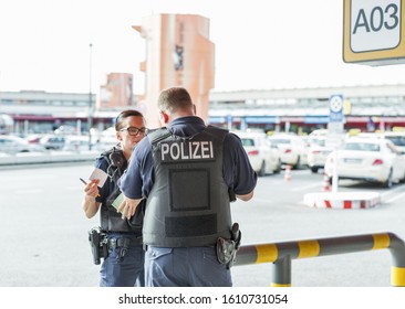 BERLIN, GERMANY - OCTOBER 18, 2019: Police Patrol In Tegel Airport. Police On High Terror Alert Warned To Be Hyper Vigilant. Berlin Is The Capital And Largest German City By Both Area And Population.