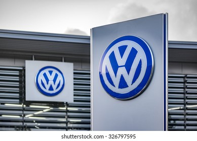 BERLIN, GERMANY - OCTOBER 5: the VW logo of the brand "Volkswagen" at a car dealer building on Oct 5, 2015 in Berlin, Germany, Europe. Volkswagen AG is a German automotive manufacturing company.