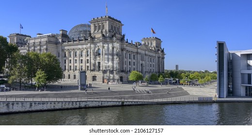Berlin, Germany – September 09, 2021: Reichstag building and Paul Loebe House along the Spree river, German Bundestag, Government district, Tiergarten, Berlin, Germany