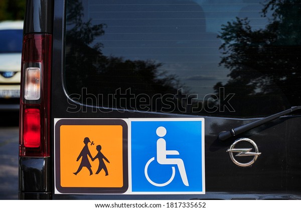Berlin, Germany - September 12, 2020: Signs on\
a school bus for handicapped\
children.