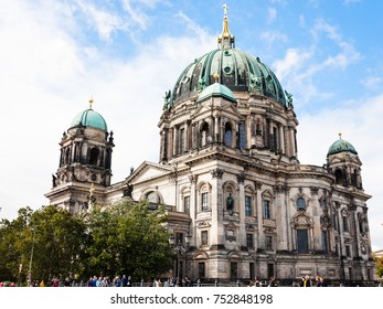 BERLIN, GERMANY - SEPTEMBER 13, 2017: people near Berlin cathedral (Berliner Dom) on Museum Island in Berlin city. The current building of the church was finished in 1905.