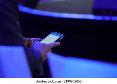 Berlin, Germany - September 2, 2022: Person Using Android Smartphone At Press Event