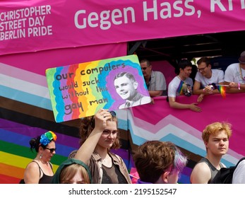 Berlin. July 23, 2022. A Woman At The Pride Festival With A Photo Of Alan Turing (who Helped Save The Brits In WWII) And A Message On A Cardboard: 