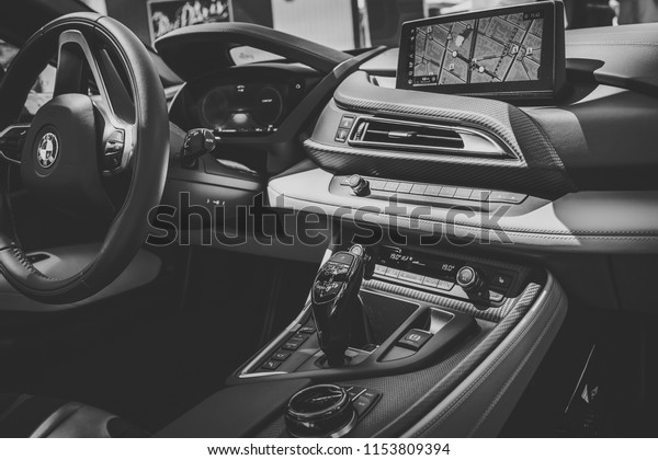 BERLIN -\
JUNE 09, 2018: Showroom. Interior of a plug-in hybrid sports car\
BMW i8 Roadster. Black and white.\
Stylization.