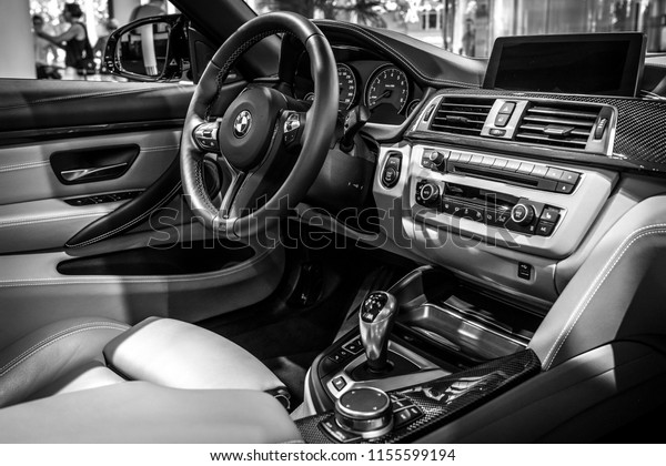 BERLIN -\
JUNE 09, 2018: Showroom. Interior of a compact executive car/Sports\
car BMW M4 Cabrio. Black and\
white.