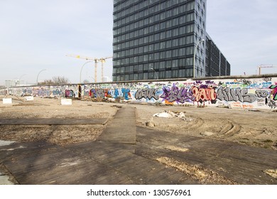 BERLIN - MARCH 06: The East Side Gallery Is Under Worldwide  Protest In Terms Of The Removal Of Several  Berlin Wall Segments  To Allow The Construction Of A Luxury Hotel In  MARCH 06, 2013 In Berlin.