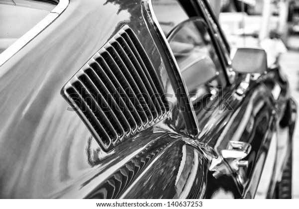 BERLIN - MAY 11: Air vents of the\
car body Shelby Mustang GT350, black and white, close-up, 26th\
Oldtimer-Tage Berlin-Brandenburg, May 11, 2013 Berlin,\
Germany