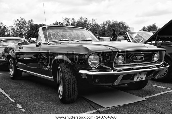 BERLIN - MAY 11: Car Ford Mustang convertible,\
first generation (black and white), 26th Oldtimer-Tage\
Berlin-Brandenburg, May 11, 2013 Berlin,\
Germany