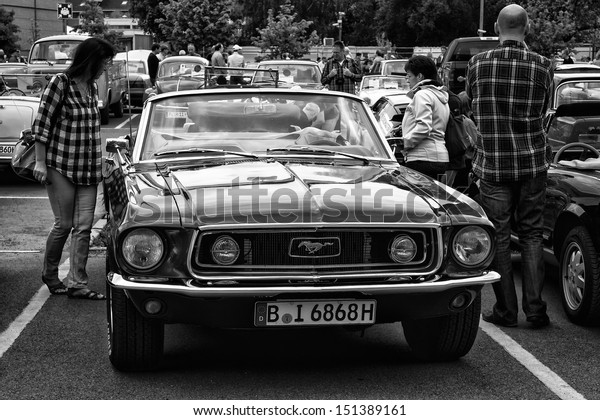 BERLIN - MAY 11: The sports car Ford Mustang GT\
convertible (black and white), 26th Oldtimer-Tage\
Berlin-Brandenburg, May 11, 2013 Berlin,\
Germany