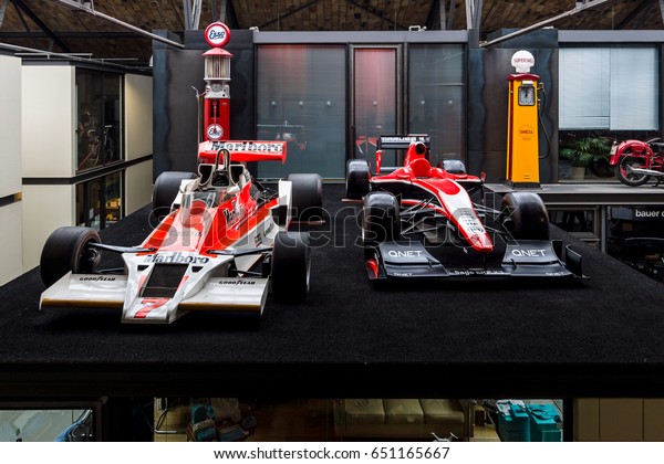 BERLIN - MAY 13, 2017: Formula One\
racing cars McLaren M26 (1976) and Marussia MR02 (2013). Exhibition\
\