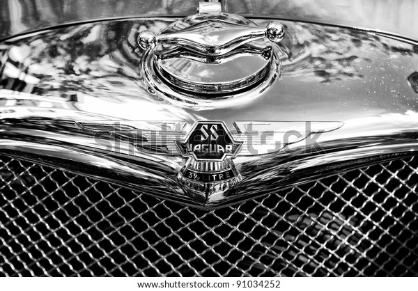 BERLIN\
- MAY 28: The emblem of Jaguar SS100 (Black and White), the\
exhibition \