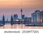 Berlin with the river Spree after sunset with the Oberbaum Bridge and the famous Television Tower