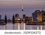 Berlin with the river Spree at dusk with the Oberbaum Bridge and the famous Television Tower