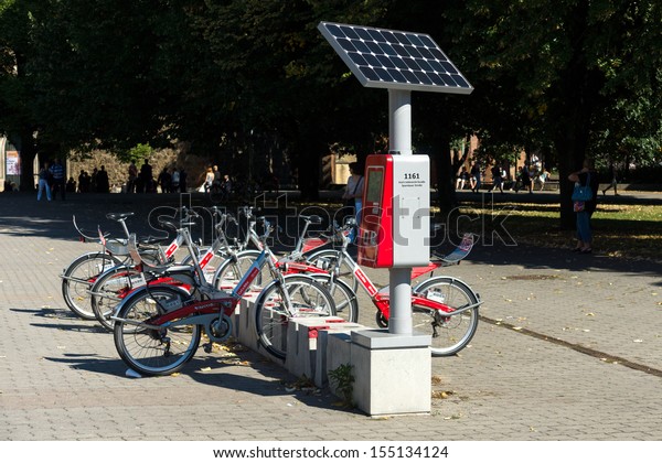 BERLIN - SEPTEMBER\
07: Bicycle rental company Deutsche Bahn (German Railways),\
autonomous (solar panels) work machine to pay rent, on September 7,\
2013 in Berlin, Germany