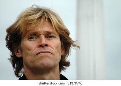 BERLIN - SEPTEMBER 9: Hollywood Actor Willem Dafoe Looks At Photographers During  A Discussion September 9, 2006 In Berlin.