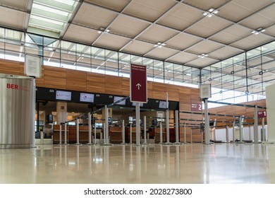 Berlin Schönefeld, Spring 2021: Check-in In The Terminal Hall Of The New Berlin Brandenburg Willy Brandt International Airport. Worm's Eye View Of The Check In Desk. No People.