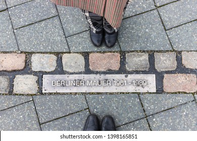 Berlin Wall Memorial Line With People On Each Side