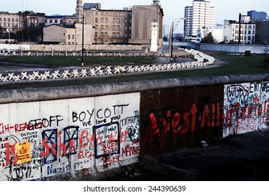 The Berlin Wall separated Communist-controlled East Germany from West Berlin. White apartments of West Berlin contrast with the boarded up vacant brick buildings of East Berlin. June 1 1983.