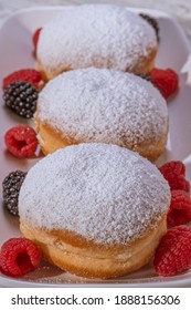 Berliner Jelly Filled Doughnut With Raspberry And Blackberry.