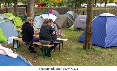 Berlin/Germany - October 12 2019: Activists of Extinction Rebellion at the  protest camp in Berlin near the Bundestag. Climate activists set up a camp ahead of protests outside Merkel's office.