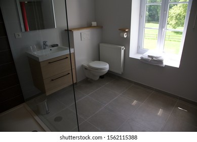 Bermicourt, Haut-de-France/France-June  28 2019: interior - a contemporary bathroom lit with natural light - Powered by Shutterstock - Get 15% off with code: PIKWIZARD15