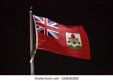 Bermuda Flag Blowing In The Wind At Night