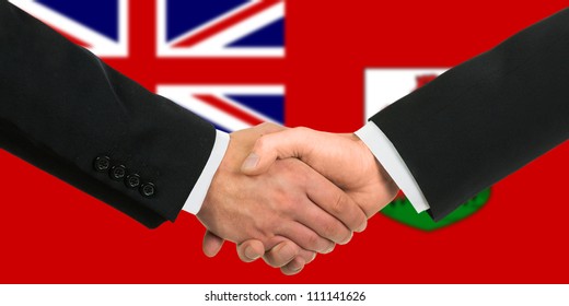 The Bermuda Islands Flag And Business Handshake