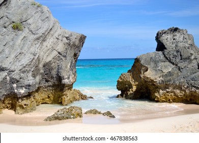 Bermuda Pink Sand, Blue Sea, And Rock Landscape