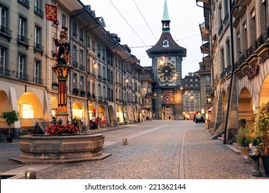 Bern, Switzerland - 17 September 2013: People On The Shopping Alley With The Famous Clocktower Of Bern On Switzerland