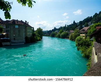Bern, Switzerland / July 2, 2019 : A View of the Aare with Old City in Bern, Switzerland. - Shutterstock ID 1564786912