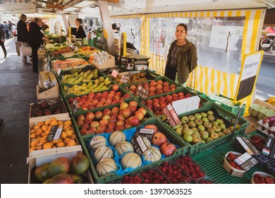 Bern, Switzerland - March 30, 2019: Downtown Bern, Switzerland There Are People In Traditional Markets Who Want To Buy Things. 