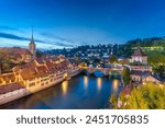 Bern, Switzerland on the Aare River at night.